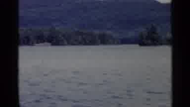 Lake George New York (1955): Boating On Water Passing Tree Covered Mountains And