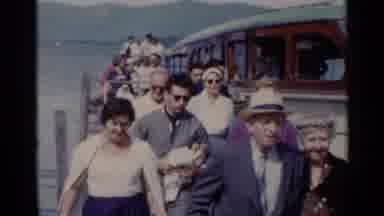 Lake George New York (1955): Large Group Of People Walking On A Bridge After