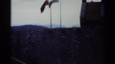 Lake George New York (1955): Two Country Flags Blowing Majestically In The Wind
