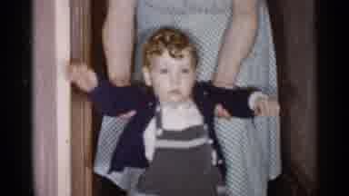 New York City (1955): Little Kid Walking As Mom Walks Behind Him Holding Him