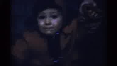 New York City (1955): Small Child In Read Coat Being Video Taped Outside With