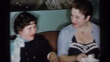 New York City (1955): Three Women Sitting On A Sofa And The Lady In The Middle
