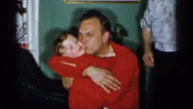 New York City (1955): Dad Holding And Kissing His Kid As People Around Him Watch