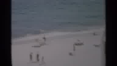 Cape Cod Massachusetts (1956): Couple Looking At People Walking On Beach On A
