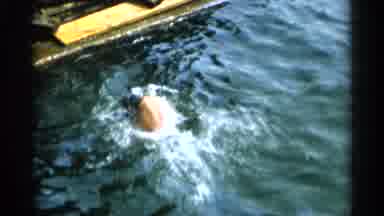 Cape Cod Massachusetts (1956): Man Diving Underwater While Swimming By Docks