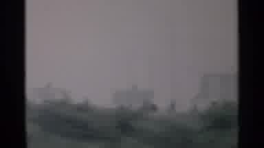 Cape Cod Massachusetts (1956): Passing Green Trees And White Homes On A Cloudy Day