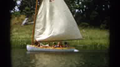 Cape Cod Massachusetts (1956): Small Sailboat And A Small Canoe Carrying People