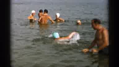 Cape Cod Massachusetts (1956): People On Holidays Swimming In A River And Waving