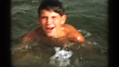 Cape Cod Massachusetts-1956: Boy Swimming Having Fun With His Mom At The Beach