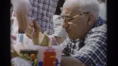 Jones Beach New York (1956): Balding Older Man In Glasses Eats At Outdoor Event