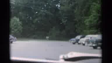Jones Beach New York (1956): A Car Pulls Into A Parking Lot To Park A Man Is Very