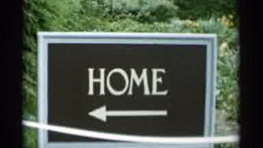 Jones Beach New York (1956): Black And White Sign Pointing To Tan Mansion On A