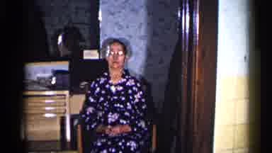 Duluth Minnesota-1960: Old Christmas Home Movie Featuring Grandmother And New Gift