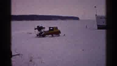 Duluth Minnesota (1960): White Man In Old Car Near River With Boat