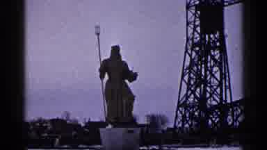 Duluth Minnesota (1960): Statue Of Man Holding Trident On A Cloudy Day