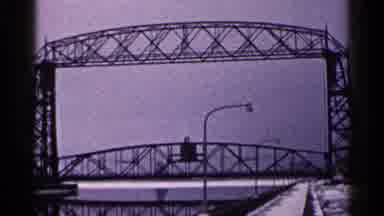 Duluth Minnesota (1960): A Bridge And Lighthouse In The Winter On A Gloomy Day