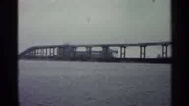 Duluth Minnesota (1960): A Bridge Built On Pilings Spans A Body Of Water Such As A