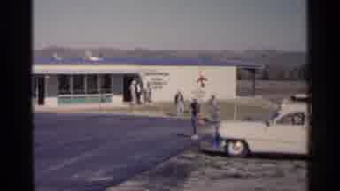 Sioux Falls South Dakota (1960): Group Of Men Move Toward Car From Building