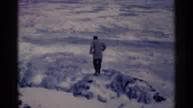 Duluth Minnesota (1961): A Guy Walking Across A Frozen Tundra But He Is Warm No