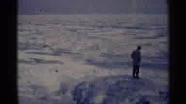 Duluth Minnesota (1961): A Person Standing And Spinning In A Vast Landscape Of
