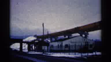 Duluth Minnesota (1961): Snow Surrounds A White House Surrounded By A Fence That
