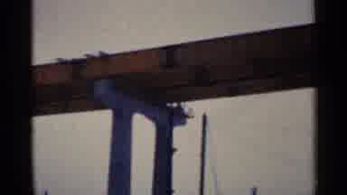 Duluth Minnesota (1961): A Span Of Railroad Bridge With Power lines And Buildings