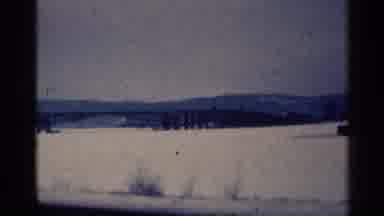 Duluth Minnesota (1961): A Big Ling Bridge Over A Large Body Of Water With A Train