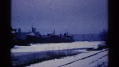 Duluth Minnesota (1961): A Very Snowy Landscape That Shows A Factory And Then A