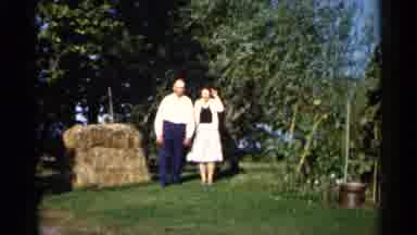 Duluth Minnesota (1961): Two Old People Posing Together A Backyard In Front Of A