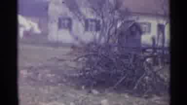Spain (1961): A Big Pile Of Sticks Sitting Out In Front Of Someone's House