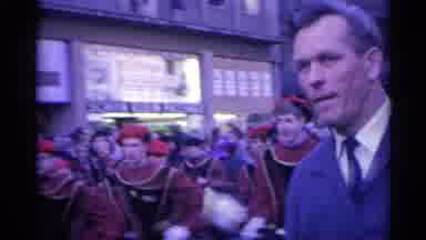 Spain (1961): A Group Of People Wearing Black And Red In A Marching Band Playing