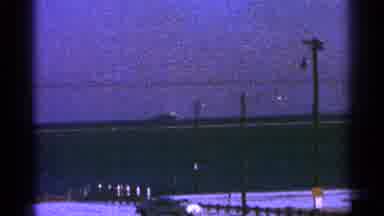 Milwaukee Wisconsin-1964: A Large Ship Sailing on the Ocean at Dusk