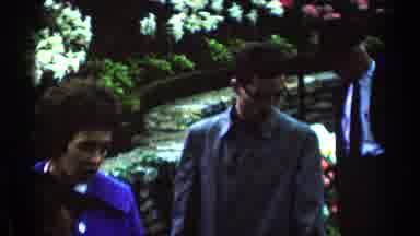 Minnesota USA (1964): Four Men In A Garden With Water Fountain Looking Around At