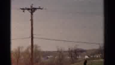 Minnesota USA (1964): Close Up Grey Building Shrouded In Fog On A Cloudy Day