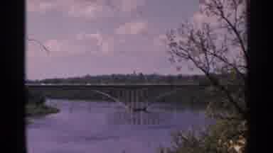Minnesota USA (1964): Forest With A Lake And Bridge