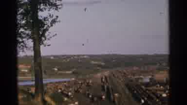 Minnesota USA (1964): A Large Body Of Water Around Lots Of Greenery And A Pile Of