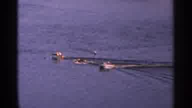 Minnesota USA (1964): There Are Three Boats Going On The Water