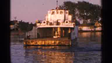 Minnesota USA (1964): Empty Boat On The Water During Sunset Behind The Mountains