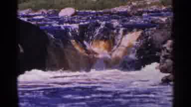 Minnesota USA (1964): Beautiful Natural Waterfall Cascading Into Rushing Waters On