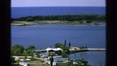 Washington Island Wisconsin (1964): A House And Other Buildings Sitting Near A