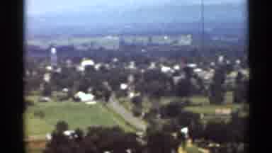 Arkansas USA (1965): Aerial A City With A Large Green Area And Houses