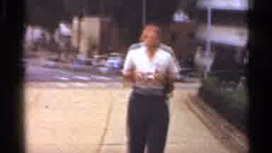 Arkansas USA (1965): A Man Walking In A Flower Garden In The City