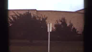 Kansas City Missouri (1965): Grass With Some Bushes Street Sign And A Yellow