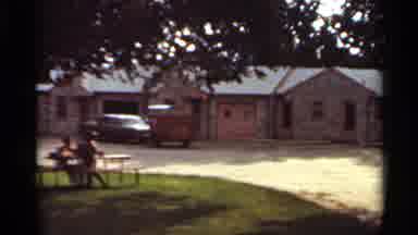 Kansas City Missouri (1965): Cars Parked In Front Of One-Level Houses While People