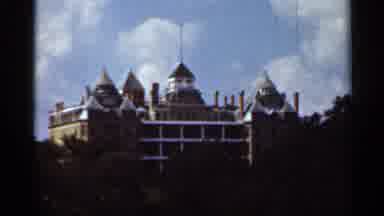Kansas City Missouri (1965): Buildings In Trees And Motel Sign With Blue Skies