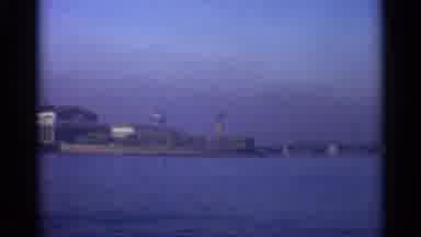 LENNINGRAD RUSSIA-1965: Panoramic Waterfront View Of City With Lighthouses And Bridge