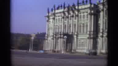Lenningrad Russia (1965): A Blue And White Bus Is Parked In Front Of A Green