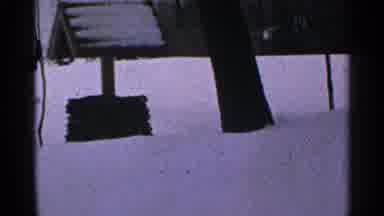 Minnesota USA (1965): A Well On A Snow Surrounded By Leafless Trees During Winter