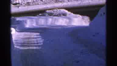 Minnesota USA (1965): A Steep Snowy Hill That Ends With A Sharp Corner And