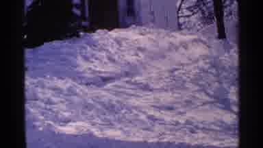Minnesota USA (1965): A Family Driveway After A Snowstorm With Tall Snow Banks And